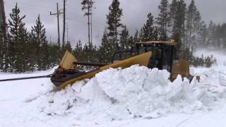 Plowing snow from roads in the spring in Yellowstone National Park [upl. by Drofniw]