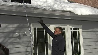 Preventing ice dams Experts show you how to clear snow from roof before thaw  ABC7 Chicago [upl. by Ettedo838]